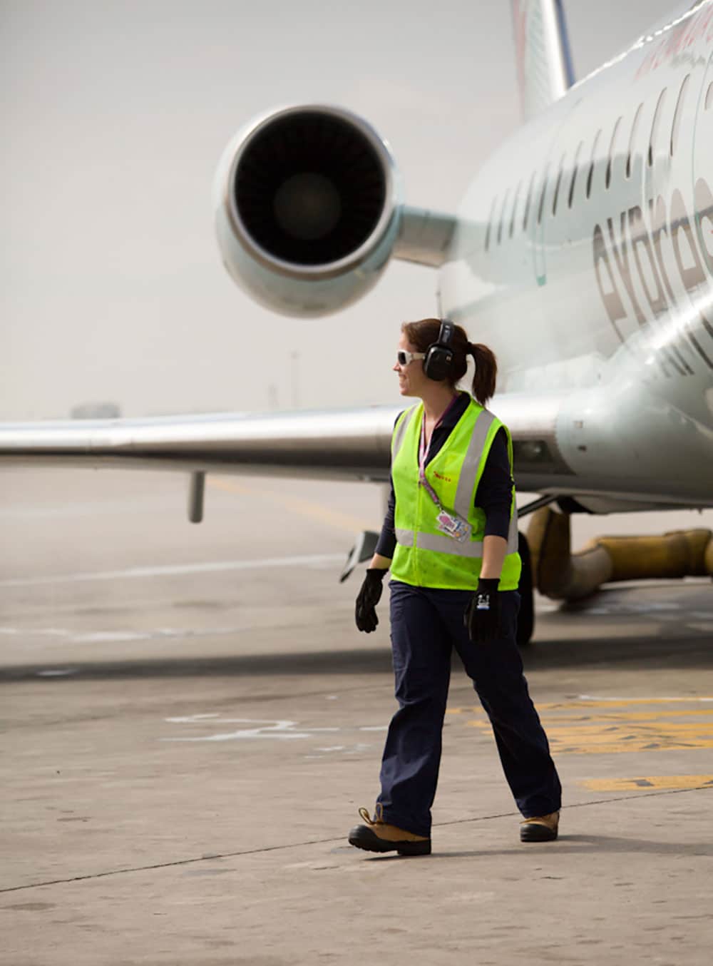 Ground crew near aircraft.