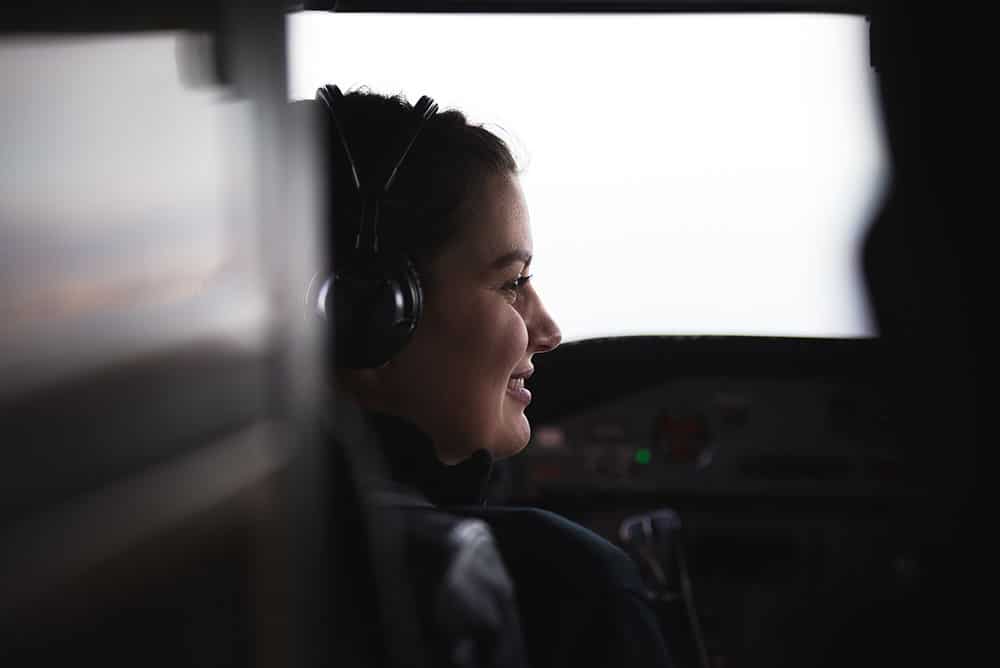 Profile of smiling pilot.