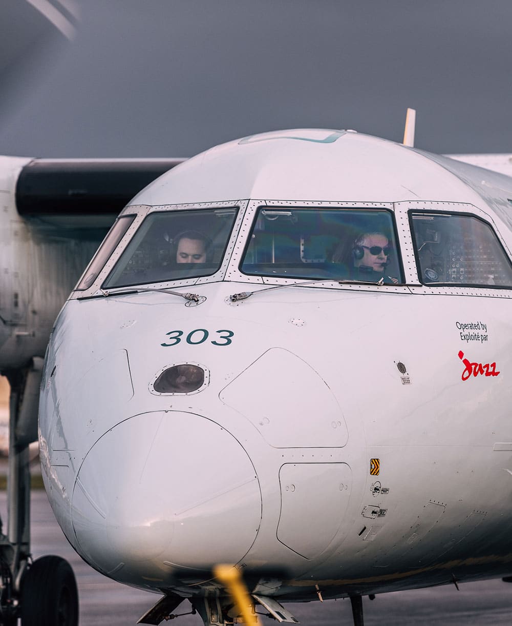 Exterior of nose and cockpit of an airplane.
